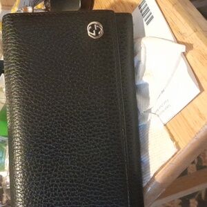 Gucci pebble leather long wallet